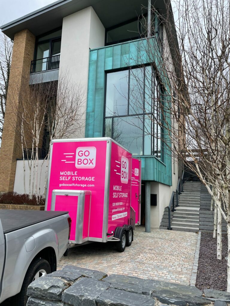 Go Box Trailer parked in front of building
